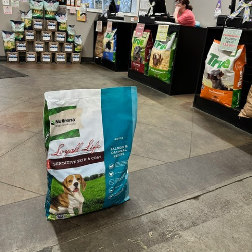 A bag of dog food inside of Rogers